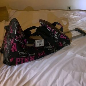 Pink 86 travel bag pull handle wheels